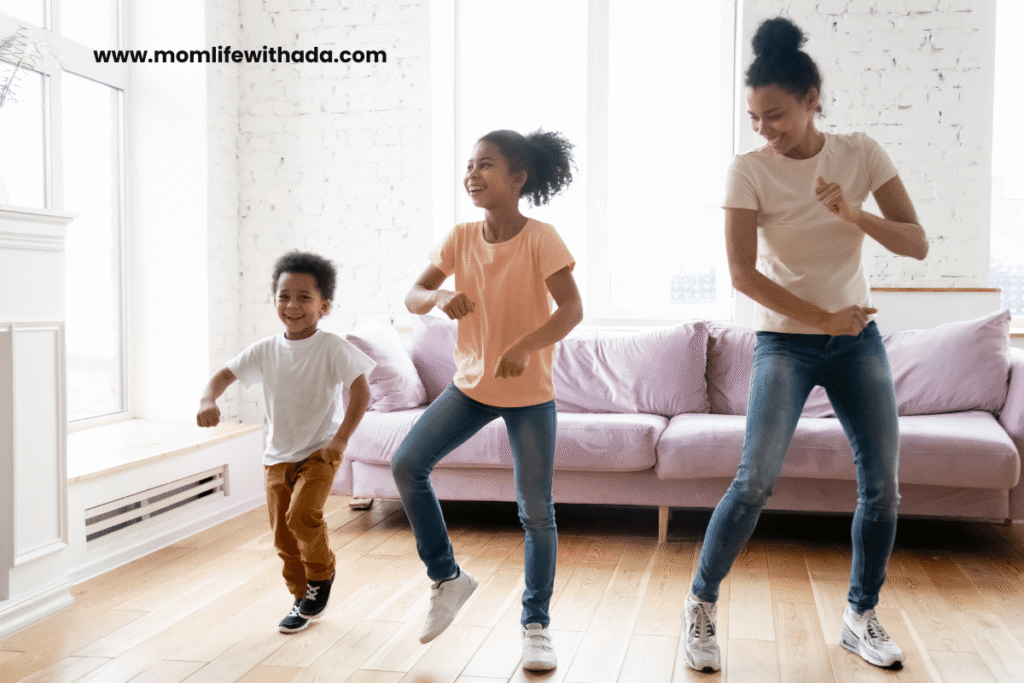 mom and toddler dancing in living room laughing together — cozy self-care ideas with kids