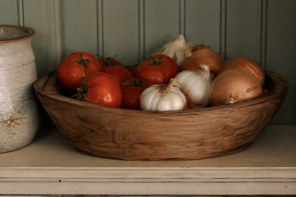 Fresh vegetables arranged on a kitchen counter showing how to store vegetables properly