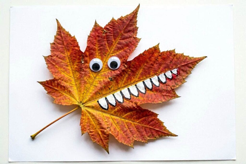 fall leaf monster craft for toddlers using big autumn leaf